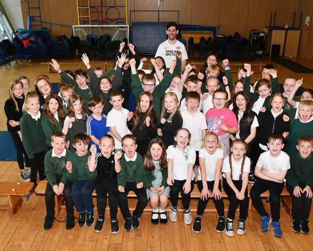 David Smith, GB and Scotland high jumper, visit St Margaret's Primary in Polmont to take part in Sports for Champions day.