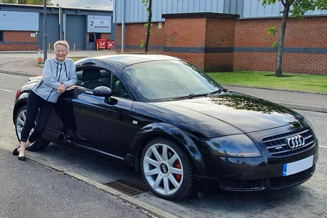 Mary Reid with her prized Audi TT