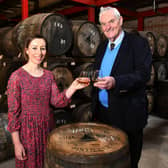 George Stewart, Falkirk Distillery owner and founder, has donated the 40th cask of Cadger's Whisky to raise vital funds for Strathcarron Hospice as part of the facility's 40th anniversary celebrations. George is pictured with Claire Kennedy, Strathcarron's corporate fundraiser. Picture: Michael Gillen.