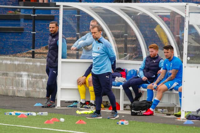 Max Christie has blasted decisions to red card two of his players at Wick