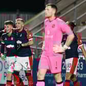 Finn Yeats and Callumn Morrison celebrate the latter scoring against Dundee United (Photo: Michael Gillen)