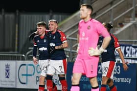 Finn Yeats and Callumn Morrison celebrate the latter scoring against Dundee United (Photo: Michael Gillen)