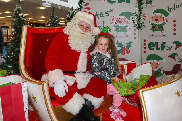 Ruby, 6, from Falkirk, meets Santa in his grotto in The Howgate.