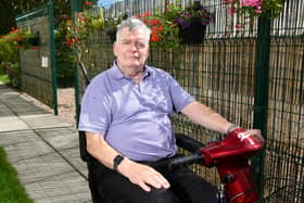 Jimmy Bain (81), who has Parkinson's disease, has been ordered to take down the hanging baskets which he enjoys looking at from the window of his Harley Court home