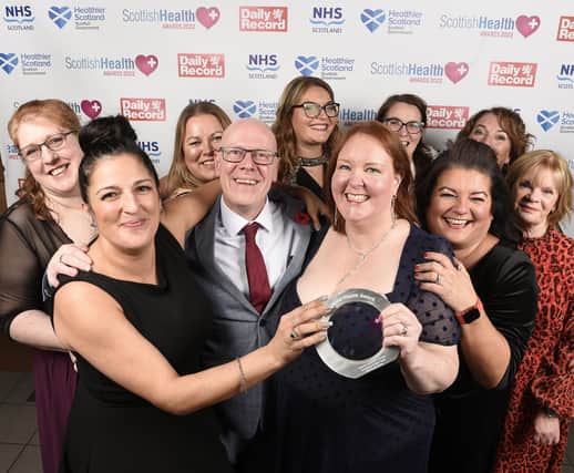 Presenter Kevin Stewart MSP, Minister for Mental Wellbeing and Social Care, Scottish Government with winners of the Care for Mental Health Award, the Trauma Informed Cervical Screening Project Team from NHS Forth Valley