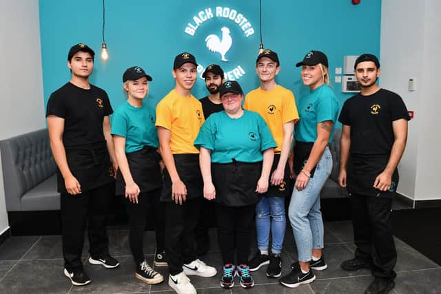 Some of the team members at the new Black Rooster Peri Peri branch in Stenhousemuir
(Picture: Michael Gillen, National World)