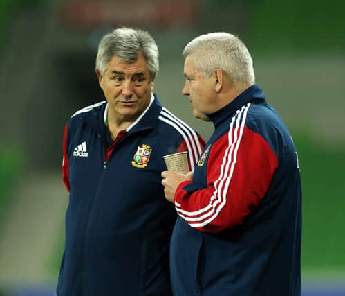 Who is this former Scotland and Lions full-back stood beside Warren Gatland? (Photo by David Rogers/Getty Images)
