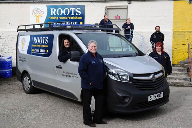 ROOTS Helping Hands Food Share volunteers received funding to buy a new van to help with their deliveries. Front: Jennifer Cochrane, secretary; Teresa Cochrane, treasurer; and Gemma Douglas, parcel coordinator. Back: Arlene Graham, chairwoman; Sheralee Maxwell, parcel coordinator; and Scott Douglas, handyman driver. Picture: Michael Gillen.