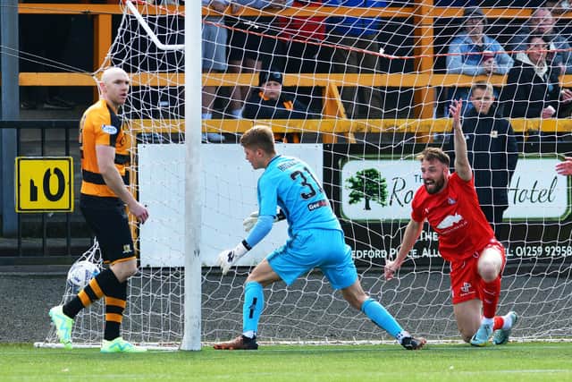 Falkirk's Brad McKay enjoys the moment as he watches his effort hit the back of the net against Alloa Athletic
