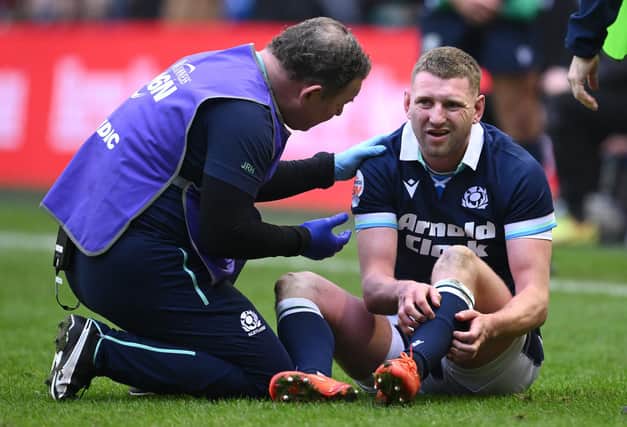 Ex-Falkirk star Finn Russell had to go for a head injury assessment during the loss to Ireland (Photo: Stu Forster/Getty Images)