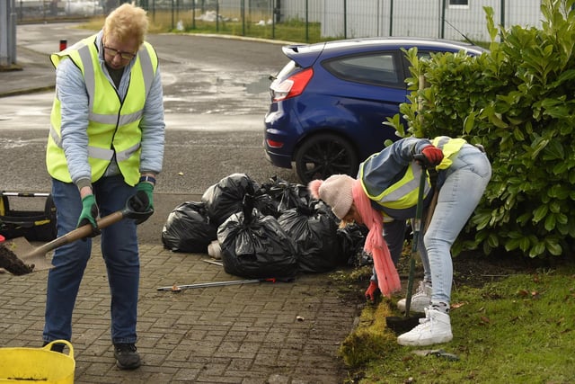 The rubbish bags start to fill up as volunteers continue their clean up in and around the Spitfire memorial