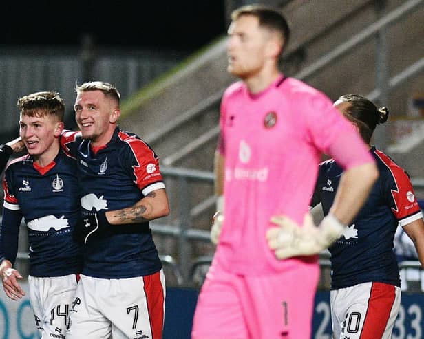 Finn Yeats and Callumn Morrison celebrate the latter scoring against Dundee United (Photo: Michael Gillen)