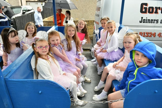 The youngsters on board one of the trailers ready to go.