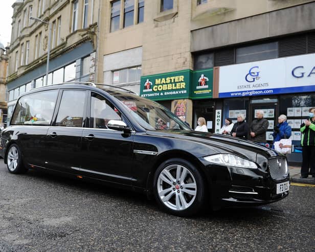 The poignant moment Alex Lawson's funeral procession passed by his former shop in Newmarket Street