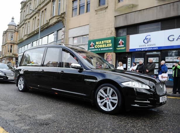 The poignant moment Alex Lawson's funeral procession passed by his former shop in Newmarket Street