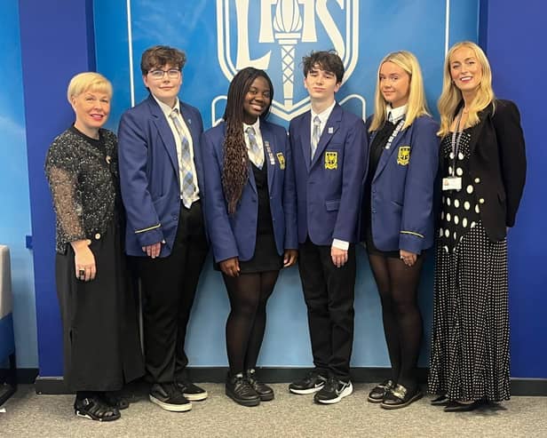 From left, Mhairi McAinsh (teacher), Kai Blackmore, Ekua Osei, Aidan Gallagher, Joanna Bolton, Jo Wilson (Headteacher, Larbert High).
