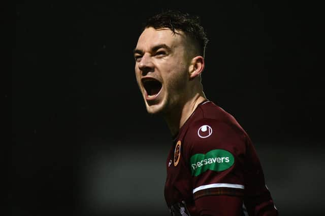 Adam Brown celebrates his stunning strike (Photo: Michael Gillen)