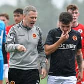Stenhousemuir boss Gary Naysmith speaks to defender Kinlay Bilham after Saturday’s 3-2 friendly win over Bonnyrigg Rose – the Warriors face a tough start to the competitive campaign (Photo: Michael Gillen)