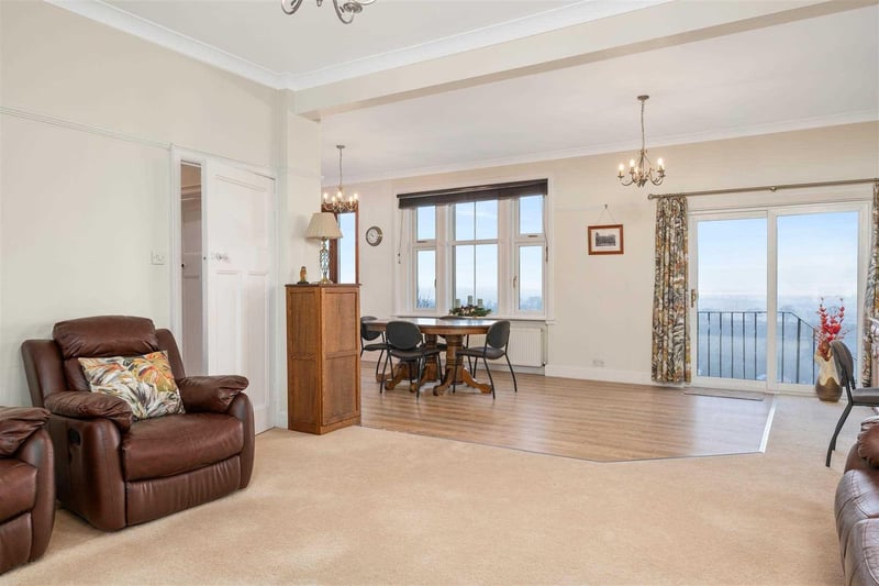 There is a large, L-shaped open plan lounge, kitchen, diner.