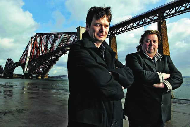 Author Ian Rankin and musician Jackie Leven pictured in South Queensferry looking over to Fife to launch their CD and live show (Pic: Phil Wilkinson/TSPL)