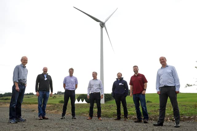Michael Matheson, Falkirk West MSP, switches on the Bespoke Wind Turbine in Lionthorn. From left: David Bennet, of Bespoke Community Development Company; Guy Wedderburn, Callendar Estate manager; Gavin Catto, of Green Cat Renewables; Michael Matheson, Cabinet Secretary for Net Zero, Energy and Transport; Jonathan Hagger, Emergya Wind Technologies; Andrew Lyle, Locogen MD; and Chris Morris, Local Energy Scotland manager. Picture: Michael Gillen.