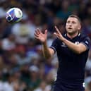 MARSEILLE, FRANCE - SEPTEMBER 10:  Finn Russell of Scotland catches the ball during the Rugby World Cup France 2023 Group B match between South Africa and Scotland at Stade Velodrome on September 10, 2023 in Marseille, France. (Photo by David Rogers/Getty Images)