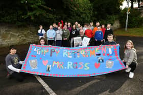 Janitor Eric Ross retired after 36 years at Grange Primary School and received £1200 from staff, pupils, parents and Grange Parent Council and other gifts including a bottle of whisky and a framed article