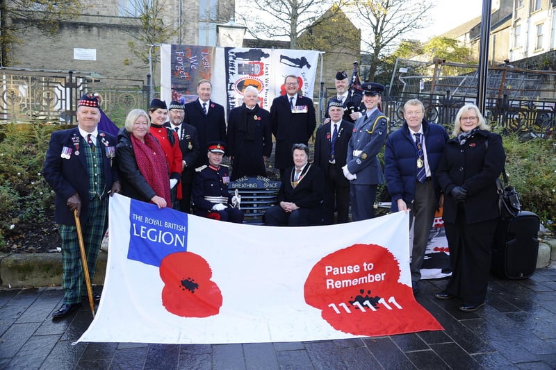 Invited guests with the new flag presented to the Grangemouth branch of Royal British Legion Scotland.