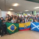Scouts from Falkirk meeting Ecuadorian & Brazilian Scouts at Schiphol on the way out to the World Jamboree. Pic: Contributed