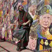 Artist Chris Rutterford with the new mural next to the Sir John De Graeme memorial fountain in Victoria Park.  (Pic: Michael Gillen)