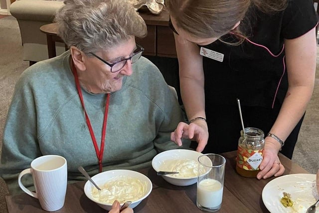 Residents of Parklands Care Home enjoying their cheese making experience