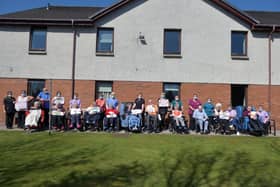 During the COVID-19 pandemic staff and residents of Carrondale Nursing Home held up messages of love to relatives