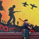 Grangemouth Armed Forces Day in 2021 saw Debbie Mulholland, a piper with Camelon and District Pipe Band, play. Pic: Michael Gillen