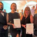 Alyson and Ross Jamieson (right) were chuffed to bits to receive two golds, a silver and bronze at the prestigious Scottish Gin Awards.