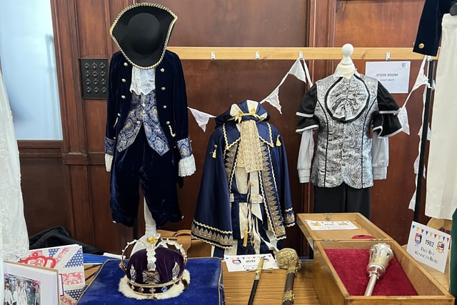 Some of the outfits from the Bo'ness Fair in the past at the Fair for the Fair exhibition.  Outfits L-R: 2002 Crown Bearer Martyn Bell. 2012 Champion Joe Young. 2020 Champion Jake Ferguson (This outfit was not worn due to the Covid restrictions)
