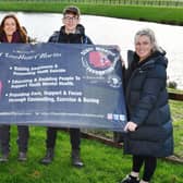 Andrew Merrilees, left and Samantha Merrilees, right, with Eleri and Ewan Brown who earlier this year raised money for the Scott Martin Foundation by climbing Kilimanjaro. Pic: Michael Gillen