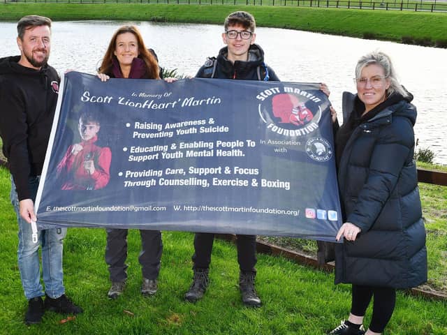 Andrew Merrilees, left and Samantha Merrilees, right, with Eleri and Ewan Brown who earlier this year raised money for the Scott Martin Foundation by climbing Kilimanjaro. Pic: Michael Gillen