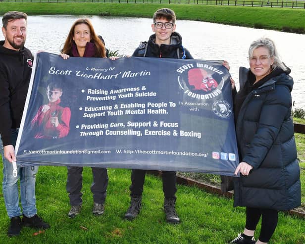 Andrew Merrilees, left and Samantha Merrilees, right, with Eleri and Ewan Brown who earlier this year raised money for the Scott Martin Foundation by climbing Kilimanjaro. Pic: Michael Gillen