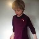 A seven-year-old boy dresses as Nicola Sturgeon for Halloween.
