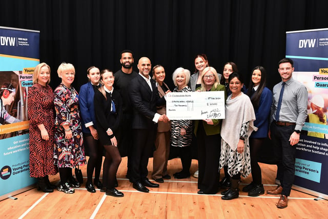 There was a £2000 cheque presentation from Amrit Dhillon to Strathcarron Hospice. Pictured holding the cheque: Amrit Dhillon, managing director of Candied Ice Cream and Fiona Hannah, deputy retail area manager for Strathcarron Hospice with pupils, staff and entrepreneurs.