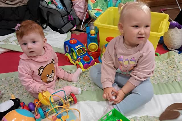 Two toddlers having fun at the new Carronshore parent and toddler group, Miley on the left, Sophie on the right. Pic: Contributed