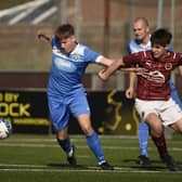 Stenhousemuir’s under-19s tussle for possession against Earlston Rhymers at Ochilview Park on Saturday in the Scottish Amateur Cup's first round (Pictures by Alan Murray)