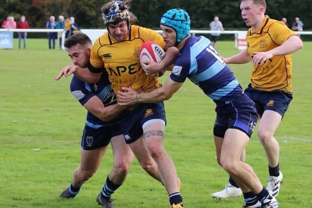Falkirk launch into the tackle during Saturday's high scoring success over Gordonians (Pics by Gordon Honeyman)