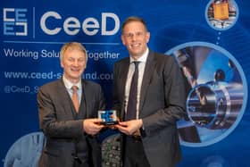 Scottish Government minister Ivan McKee, left, presents the CeeD Award for Internationalisation to Paul Davies, ADL President & Managing Director.