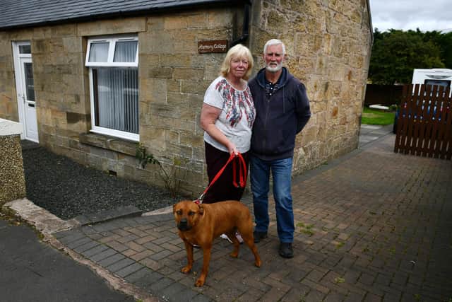 June Birnie and Jim Morrell, of Harmony Cottage, Maddiston, are seeking reimbursements for the damage done to their home by flooding and wastewater. Picture: Michael Gillen.