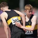 Under-17 ace Callum Hendry, who bagged silver at 800m, embraces Vics’ clubmate Luke Culliton, who sealed gold (Photo: Simon Wootton/Scottish Athletics)