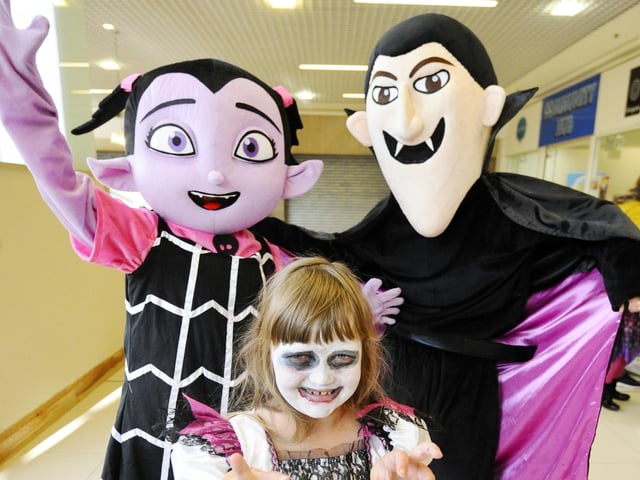 Lily Patterson (8) meets some unusual friends in the Howgate Shopping Centre.