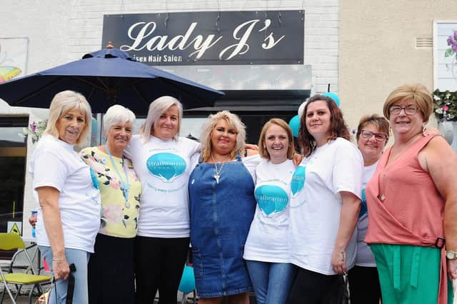 Jill Lauder, centre, has been recognised for her charity work. Pic: Michael Gillen