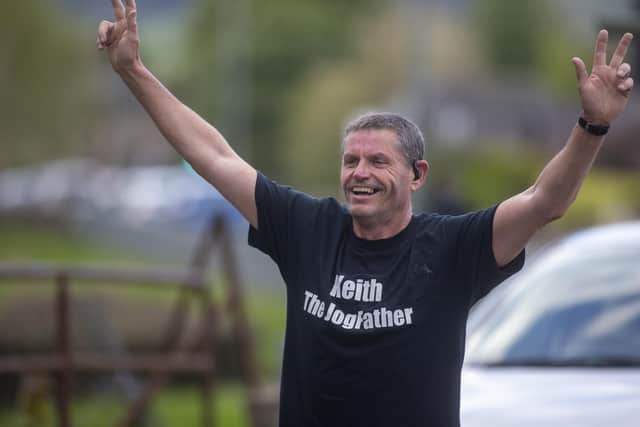 Keith 'The Jogfather' McDevitt completes the final time slot for the Jog Scotland Denny relay megathon for Strathcarron Hospice. Picture: Michael Schofield.