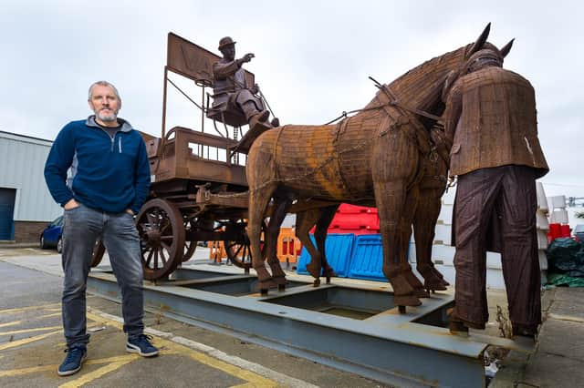 Artist Ray Lonsdale with his metal sculpture 'Gan Canny'.